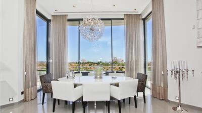 The the villa has floor-to-ceiling windows wherever a chance is offered. Courtesy Kensington Exclusive Properties