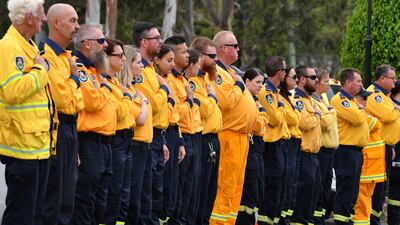 Rural Fire Service volunteers form an honor guard during the funeral for NSW RFS volunteer Andrew O'Dwyer at Our Lady of Victories Catholic Church in Horsley Park, Sydney. EPA