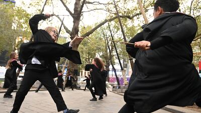 Wednesday also saw schoolchildren celebrate the 20th anniversary of the film 'Harry Potter And The Philosopher's Stone'. The children were treated to a training session by the Harry Potter films wand choreographer Paul Harris in Leicester Square, London. Reuters