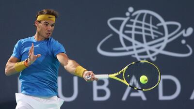 Rafael Nadal returns a ball to Kevin Anderson during their Mubadala World Tennis Championship semi-final in Abu Dhabi. Reuters