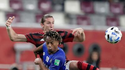 Flamengo's Filipe Luis fights for the ball with Al Hilal's Andre Carrillo. AP