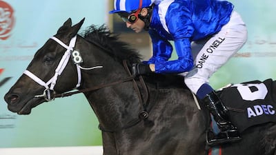 Dane O'Neill riding Udabaa to victory in the Al Reem Island Handicap at the Abu Dhabi Equestrian Club on Sunday. Christopher Pike / The National
