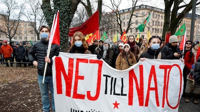 Protesters hold a banner reading 'No to Nato' during a demonstration in Stockholm on Saturday against Sweden's bid to join the alliance. AFP