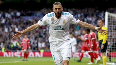 Arsene Wenger says people will want to watch teams such as Real Madrid, in white, play Bayern Munich, in red, on a more regular basis. Lars Baron / Getty Images