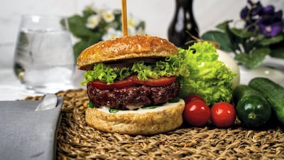 You can munch on a vegan Beyond Meat burger at the Reel Dine-In cinema. Courtesy Reel Cinemas