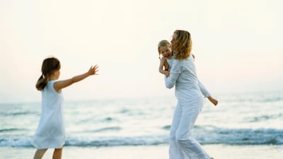 A new charter requires the custodial parent to keep the other parent informed of a child's academic reports, health status and travel plans. Photo: Corbis