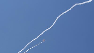 An Israeli Iron Dome defence system missile intercepts a rocket fired from Gaza over the city of Ashdod, southern Israel. Abir Sultan / EPA