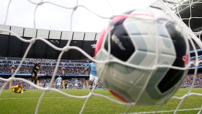 Traore scores his second goal against Manchester City. Reuters