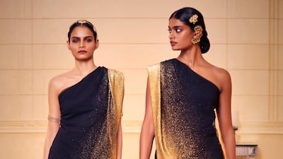 An asymmetrical black and gold kurta from Tarun Tahiliani