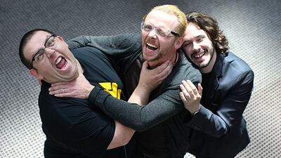 Nick Frost, left, Simon Pegg and Edgar Wright, the team behind The World's End. Suzanne Kreiter / The Boston Globe via Getty Images