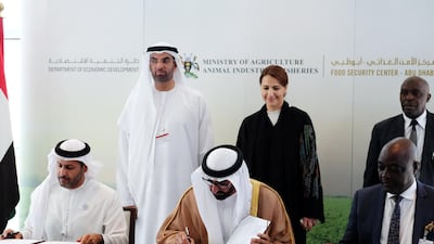 The UAE and Uganda sign an agreement to create a free zone at the Agiscape exhibition on agricultural investments and food security in Abu Dhabi. Anna Nielsen / the National