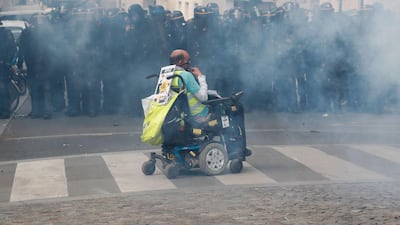 Paris riot police fired teargas as they squared off against hardline demonstrators among tens of thousands of May Day protesters who flooded the city on May 1. AFP