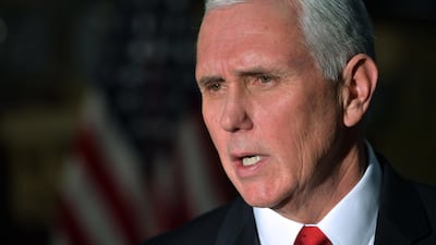 In this December 21, 2017 photo, US vice president Mike Pence speaks to reporters in a hangar at Bagram Air Base in Afghanistan. Mandel Ngan / AP