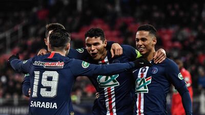 PSG's Thiago Silva, centre, celebrates after scoring their third goal. AFP