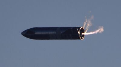 Test flight of SpaceX's first super heavy-lift Starship SN8 rocket after it launched. REUTERS