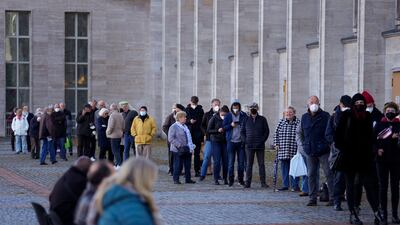 People line up for vaccinations in Berlin. AP Photo