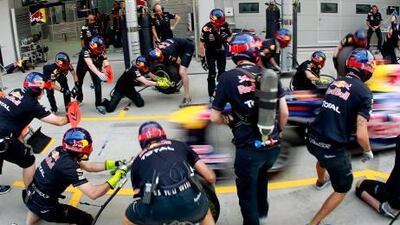 Red Bull Racing mechanics practise pit stop drills on Sebastian Vettel’s car at the Korean International Circuit in Yeongam yesterday.