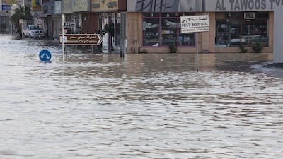 Roads and pavements across the UAE, such as this street in Sharjah, suffered heavy flooding last month. Antonie Robertson / The National