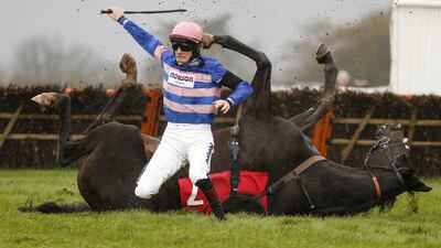 Sam Twiston-Davies riding Mont Des Avaloirs fall at the last when leading in The EBF Stallions National Hunt Novices' Hurdle Race at Wincanton racecourse in the United Kingdom. Alan Crowhurst / Getty Images