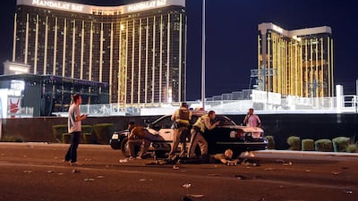 David Becker won 1st prize of the 'Spot News - Stories' category for a picture that shows Las Vegas Police outside the concert grounds after a gunman opened fire on concertgoers at the Route 91 country music festival in Las Vegas. EPA/DAVID BECKER/GETTY IMAGES