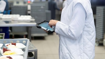 Quality control personnel in Emirates Flight Catering in January 2019. Reem Mohammed / The National