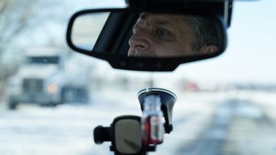 Hadi navigates the wintry roads near his home in Lincoln, Nebraska