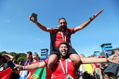 Egypt fans in high spirits at the Fan Fest in Moscow. Zurab Kurtsikidze / EPA