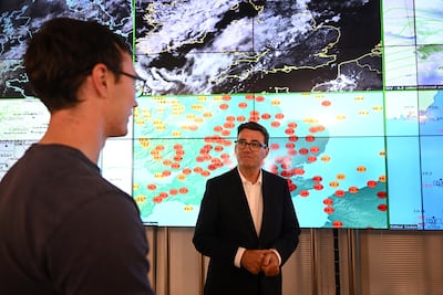 Andy Burnham visits the Met Office on the day an emergency alert about wildfires was sent out. Reuters