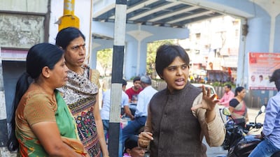 Trupti Desai talks with local women in Pune on November 24, 2016. Subhash Sharma for The National