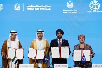 UAE Central Bank Governor Khaled Balama, UAE Minister of State for Financial Affairs Mohamed bin Hadi Al Hussaini, World Bank president Ajay Banga and IMF managing director Kristalina Georgieva at the signing ceremony. EPA