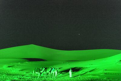 Dubai's desert glows green for St Patricks Day. Courtesy Tourism Ireland