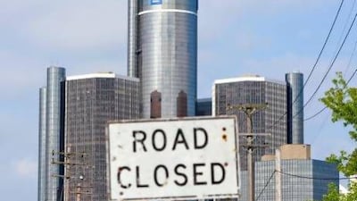 The Detroit headquarters of General Motors, which filed for bankruptcy protection in 2009, typifying the once-bustling USA city's dramatic decline. Jeff Kowalsky / Bloomberg via Getty Images