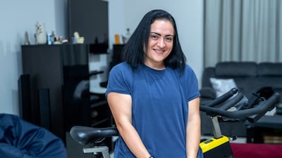 Mai Hamed wearing an old T-shirt from the days when she used to weigh more than 100 kilograms. Victor Besa / The National