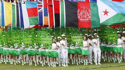Flag bearers enter the stadium during the opening ceremonies of the 2015 Athletics World Championships in Beijing on Saturday. Jeon Heon-kyun / EPA
