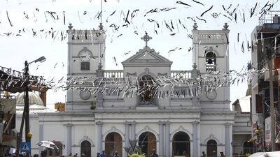White bunting is on display in front of St Anthony's Church as the city prepares for the funerals of the blast victims in Kochchikade. EPA