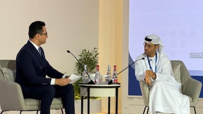 Dr Mohamed Al Kuwaiti, head of cyber security for the UAE Government, speaks with Sky News Arabia's Sami Kasmi at the Arab Media Summit. Salim A Essaid / The National