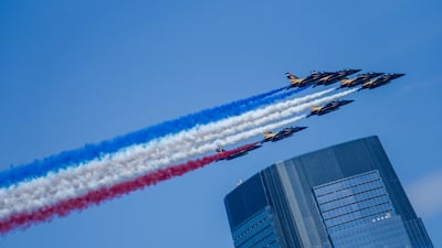 Fursan Al Emarat, the UAE's aerobatic team, over New York on July 4. AFP