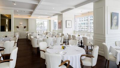 The dazzling white interiors of the French eatery La Serre Bistro and Boulangerie in Dubai. Courtesy La Serre