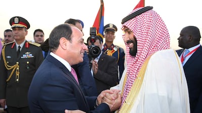 Egyptian President Abdel Fattah Al Sisi welcomes Saudi Crown Prince Mohammad Bin Salman at Cairo Airport. Courtesy Egyptian Presidency / Reuters