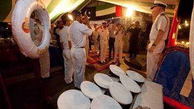A naval officer comes aboard the PNS Khaibar at a reception organised by the Pakistan Embassy on behalf of the ship’s commanding officers at Port Rashid in Dubai on Thursday.