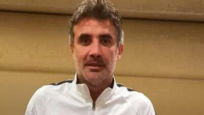 Zoran Mamic, manager of Al Ain FC, wears the red Special Olympics wrist band ahead of the Club World Cup final against Real Madrid in Abu Dhabi. Courtesy Special Olympics Abu Dhabi World Games Twitter