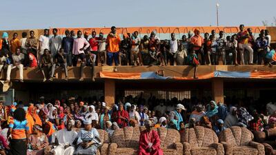 Supporters of incarcerated presidential candidate Hama Amadou attend a campaign rally in Niamey, Niger. Niger holds presidential and legislative elections on Sunday. Joe Penney / Reuters