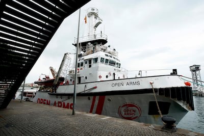 Spanish NGO Proactiva Open Arms' Astral sailboat moored in Barcelona's harbour AFP