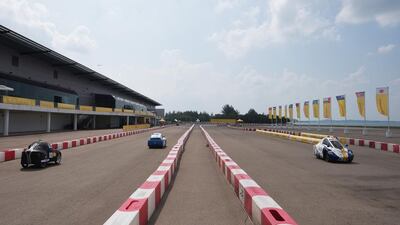 UrbanConcept cars on the track at the Changi Exhibition Centre. Joseph Nair for Shell