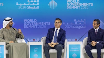 Omar Al Olama, Minister of State for Artificial Intelligence, Digital Economy and Remote Work Applications, on stage with Alibaba Group chairman Joseph Tsai and Chamath Palihapitiya, founder of Social Capital, at the World Governments Summit. Antonie Robertson/The National