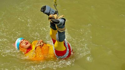 Wizard Mandrake never surfaced after being lowered into the Ganges River, while tied up with steel chains and ropes. AFP