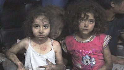 Injured children rest in a field hospital, after what activists claim were two air strikes by forces loyal to Syria's president Bashar Al Assad, in rebel-held Douma, near Damascus, on September 14. Badra Mamet / Reuters