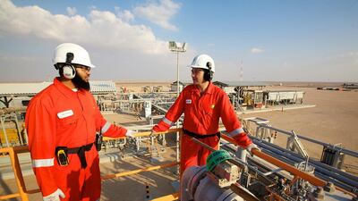 Extended Well Test Project: BP workers at the Extended Well Test Project for Khazzan, in Block 61, around 300km south of Muscat. This pilot project includes a 70-million-cubic-feet-a-day compression facility and 10 appraisal wells drilled to date, and has been helping to demonstrate the potential of a much larger scale development. Courtesy of BP