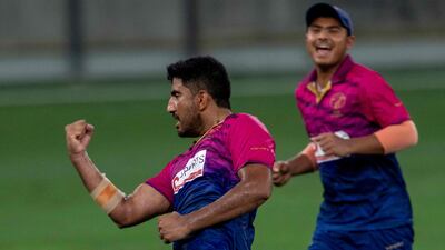 Junaid Siddique of UAE after he dismissed Mark Chapman of New Zealand. AFP