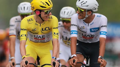 UAE Team Emirates-XRG's Tadej Pogacar, wearing the yellow jersey, with teammate Isaac Del Toro, in the white jersey, during the final Stage 21 of the Tour de France. Reuters